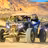 Two off-road buggies with passengers driving through desert terrain with golden mountains in Baja California Sur
