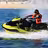 Jet ski rider in neon yellow and black watercraft wearing red life vest, riding waves off Baja California Sur beach
