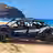 Quadruple X3 Can-Am Maverick with four riders on the beach in Cabo San Lucas